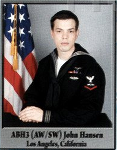 Photo portrait of ABH3 (AW/SW) John Hansen in dress blue uniform.