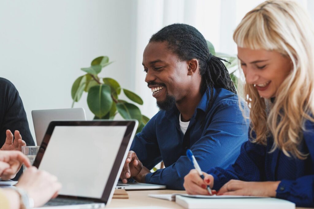 NDIS team in a meeting discussing compliance and audit readiness.