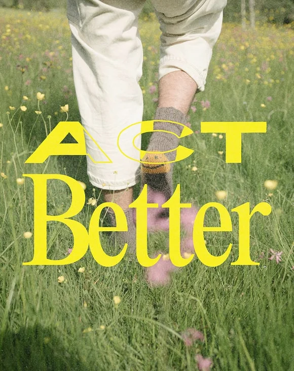 Bare feet walking through a lush wildflower meadow, symbolising conscious choices and sustainable living in nature, with the bold yellow message "Act Better".