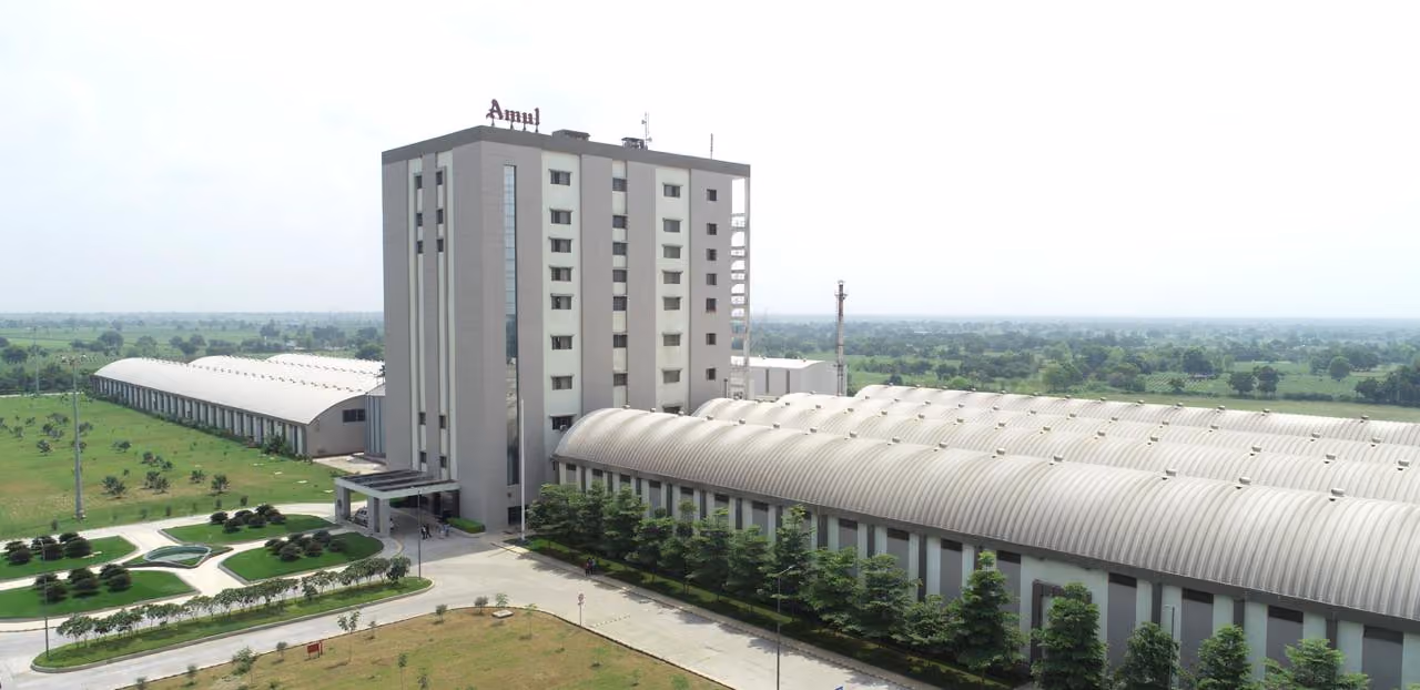 Amul industrial site with arched roofing and tower building