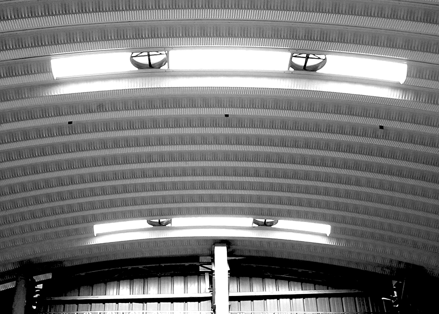 Arched ceiling with ventilators skylights and fans