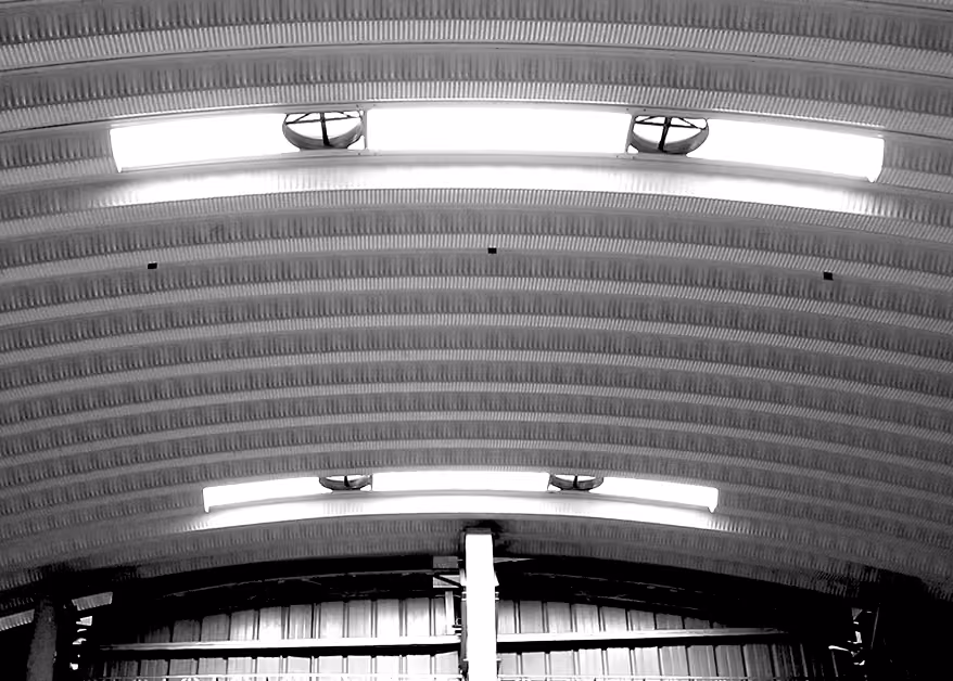Arched ceiling with ventilators skylights and fans