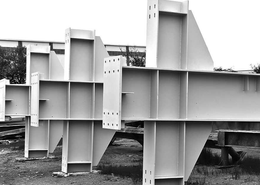 Assembled steel beams and trusses in outdoor setting