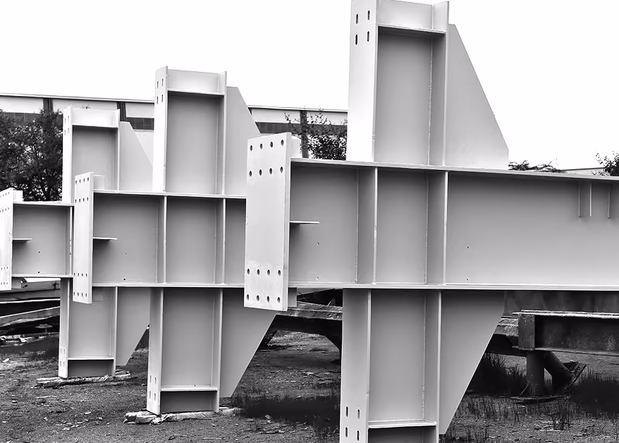 Assembled steel beams and trusses in outdoor setting