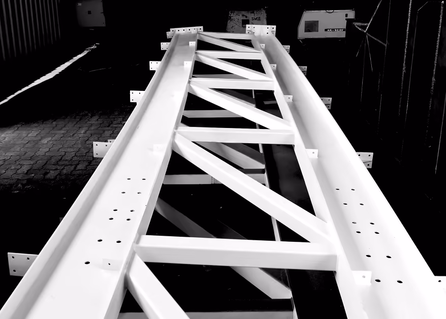 Long stainless steel girders in fabrication area