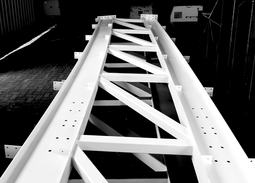 Long stainless steel girders in fabrication area