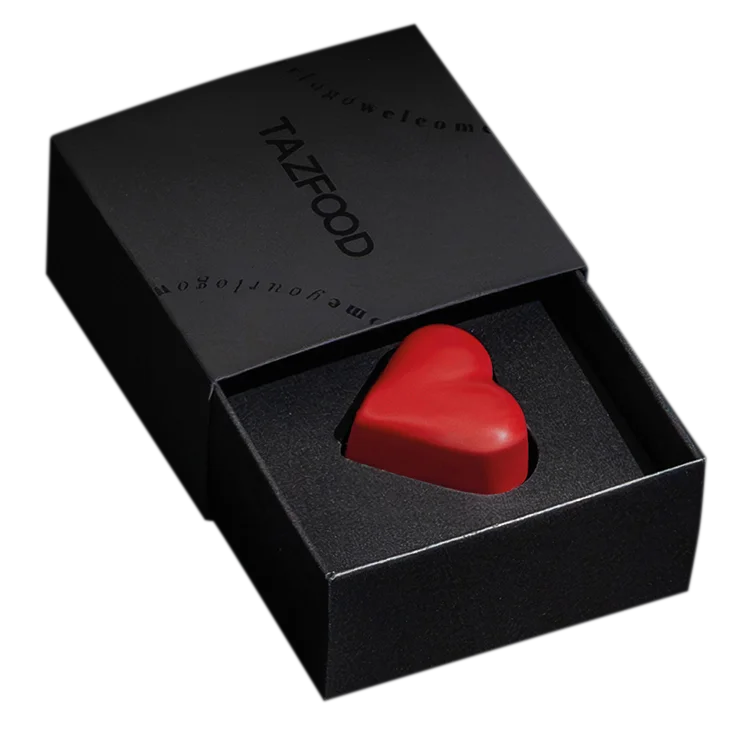 TAZFOOD's Tunnel Case with red chocolate heart inside on neutral background