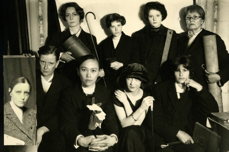 A group of people posing for a photoAI-generated content may be incorrect.