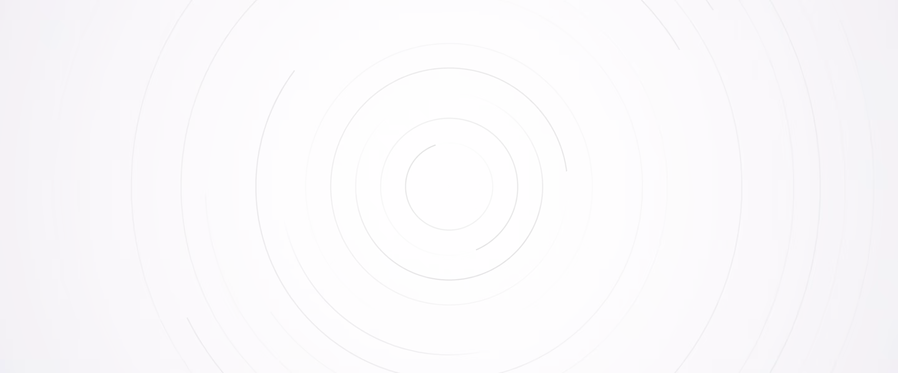 Concentric light grey circles on a white background creating a subtle ripple effect.