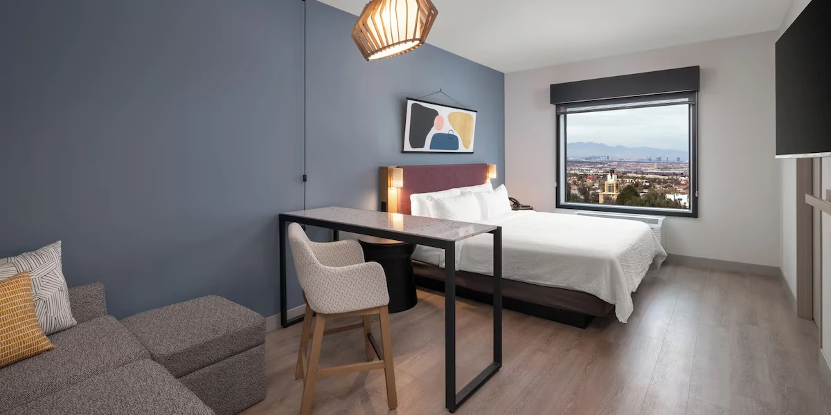 Bedroom at Atwell Suites Henderson at the Pass by IHG Hotels and Resorts.