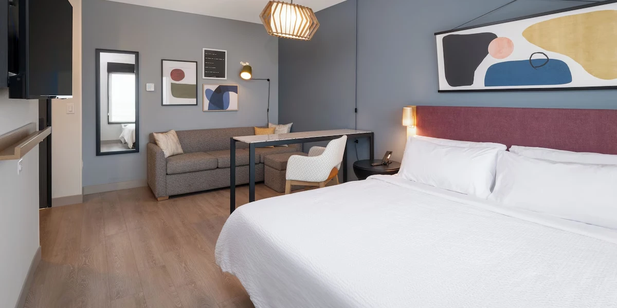 Bedroom at Atwell Suites Henderson at the Pass by IHG Hotels and Resorts.