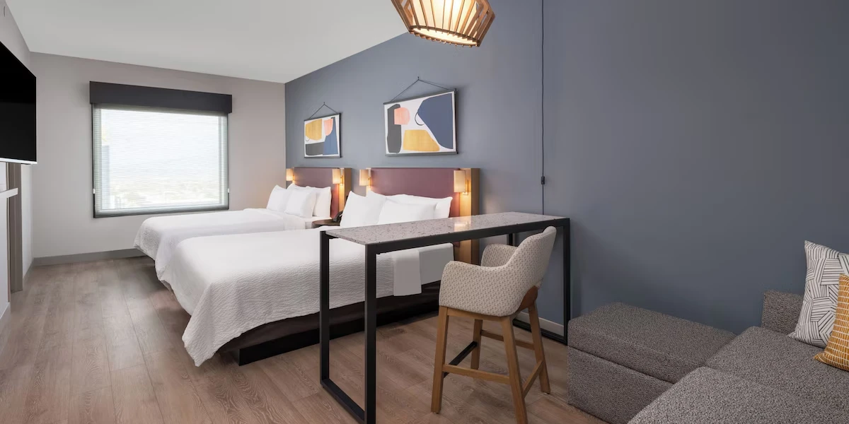 Bedroom at Atwell Suites Henderson at the Pass by IHG Hotels and Resorts.