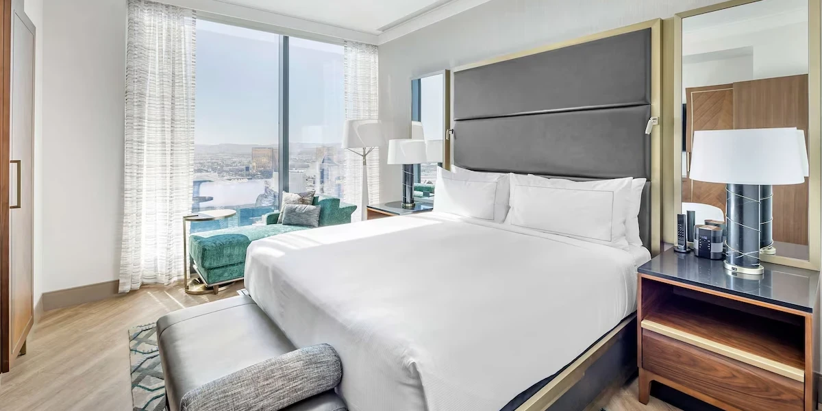 Premium One Bedroom One King Suite With Balcony Bedroom at Hilton Club Elara Las Vegas.