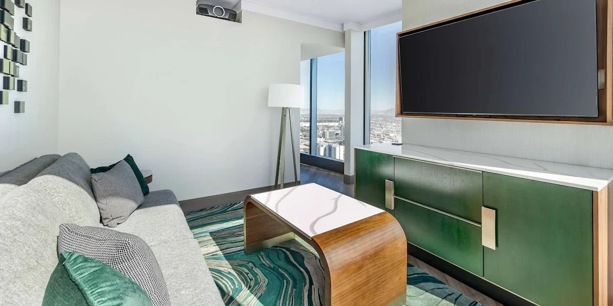 Premium One Bedroom One King Suite With Balcony Living Area at Hilton Club Elara Las Vegas.