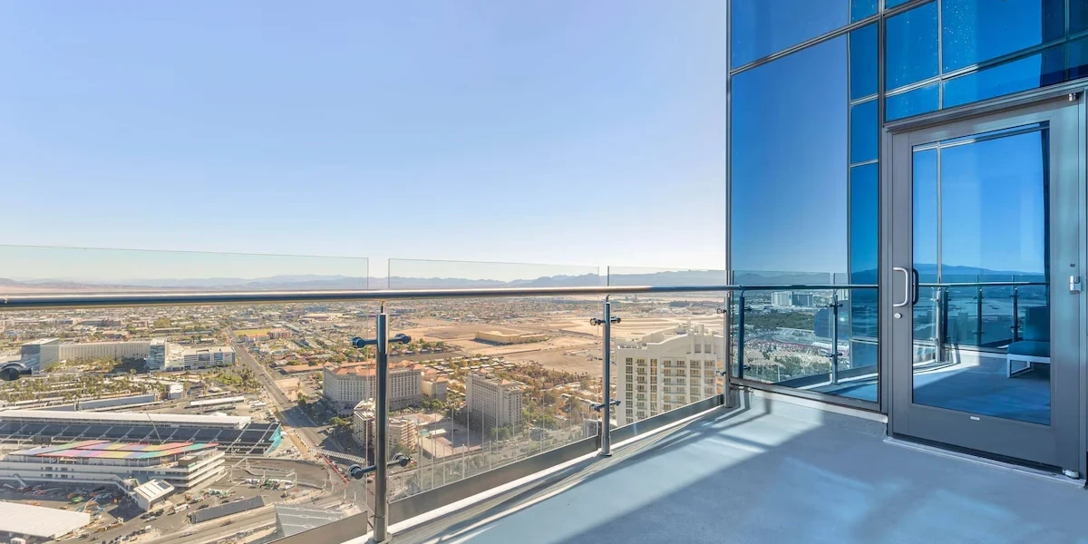 Premium One Bedroom One King Suite With Balcony Balcony at Hilton Club Elara Las Vegas.