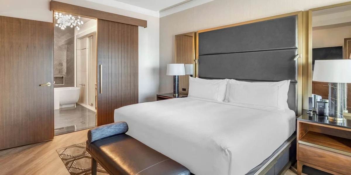Premium One Bedroom One King Suite Bedroom at Hilton Club Elara Las Vegas.