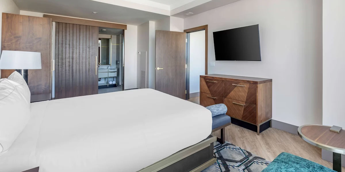 Two Bedroom Two King Entertainment Suite Bedroom at Hilton Club Elara Las Vegas.