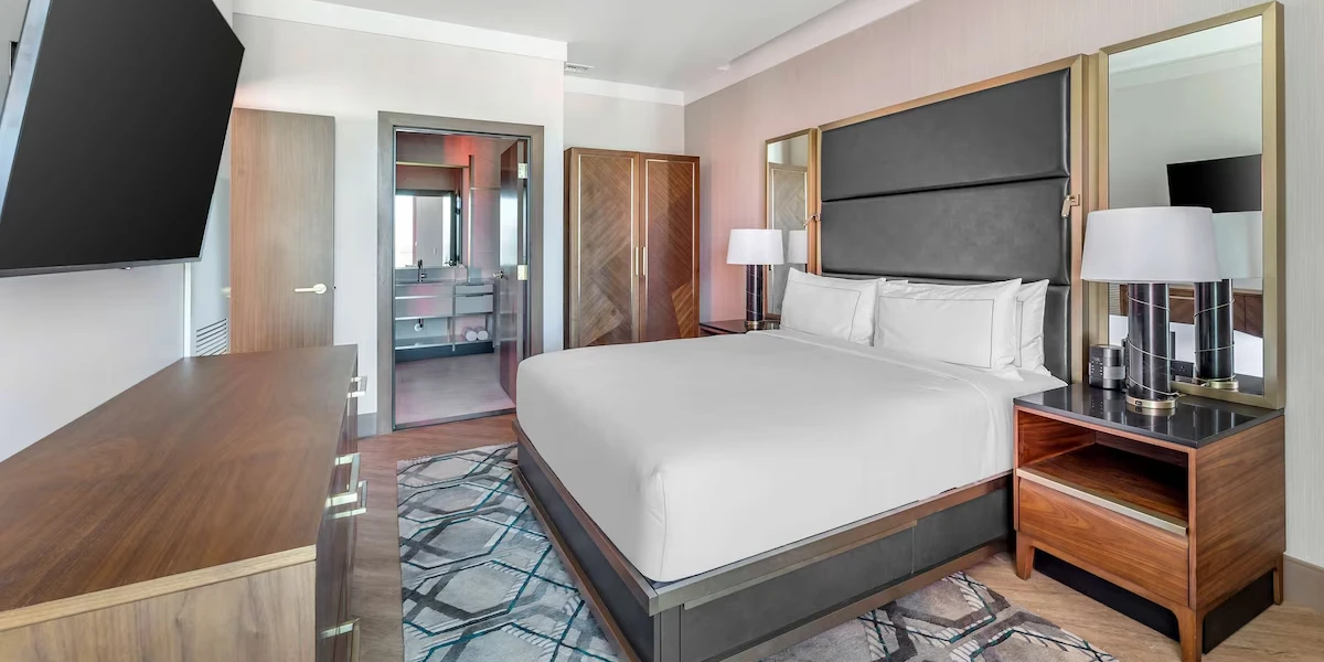 Two Bedroom Two King Entertainment Plus Suite Bedroom at Hilton Club Elara Las Vegas.