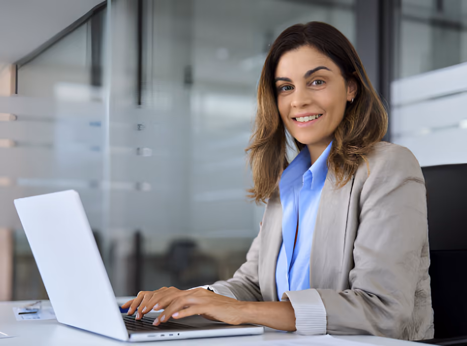 Business professional working on a laptop in an office