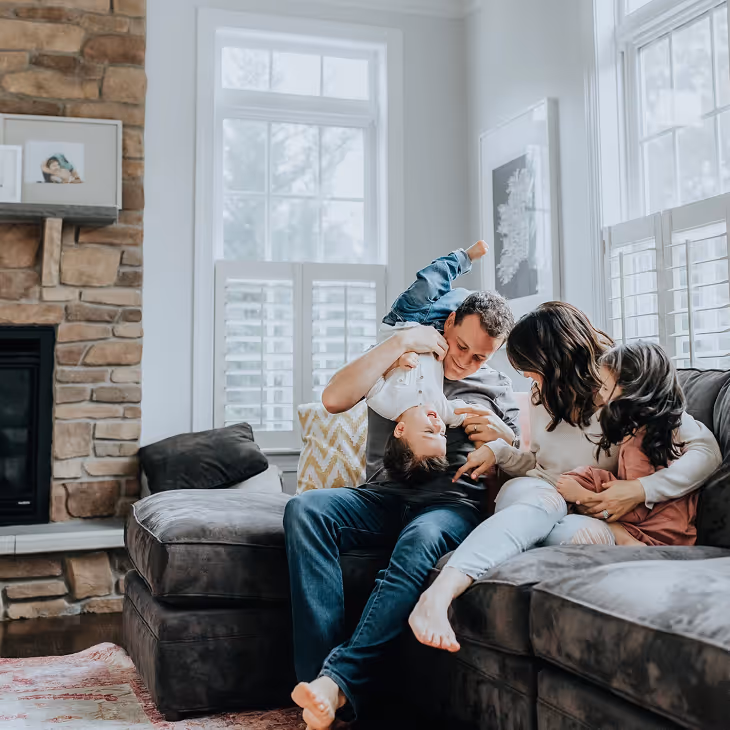 Family playing in their living room