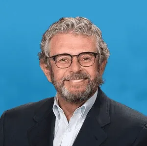 a profile headshot of Ken Morris