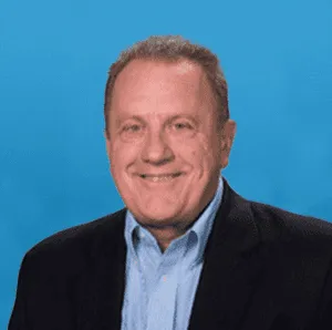 a profile headshot of Marty Whitmore