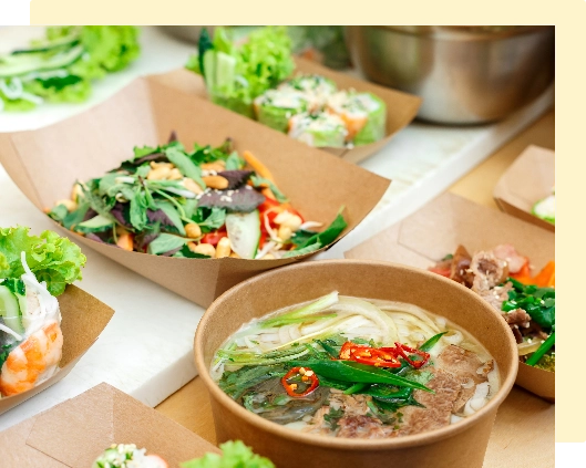 Vietnamese food in cardboard take away containers