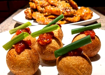 Arancini and wings from Jerk Italy