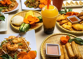 Table full of delicious Thai dishes from Thai 55
