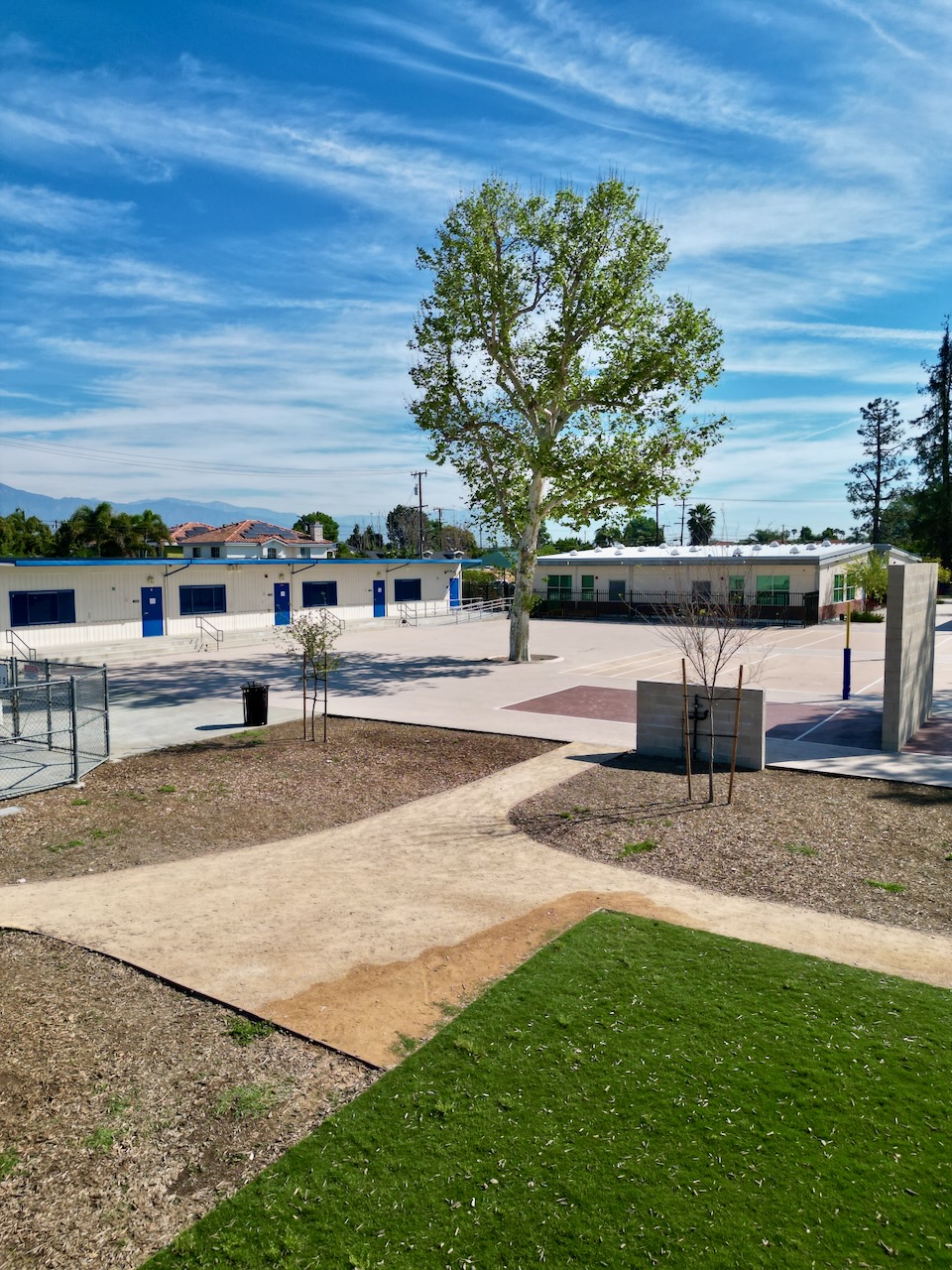 Cortada Elementary after renovation: new shade structures and outdoor gathering space.