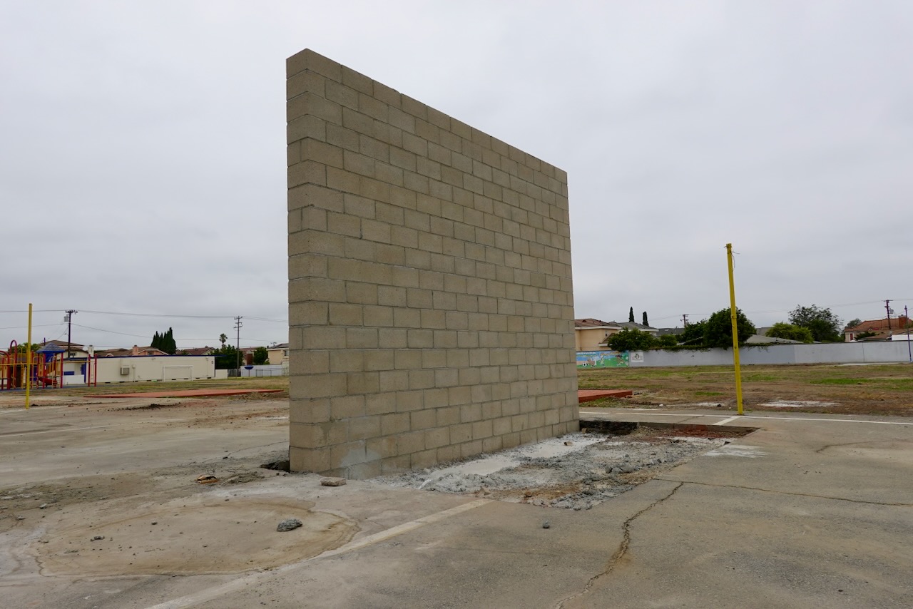 Cortada Elementary before renovation: open play area without trees or seating.