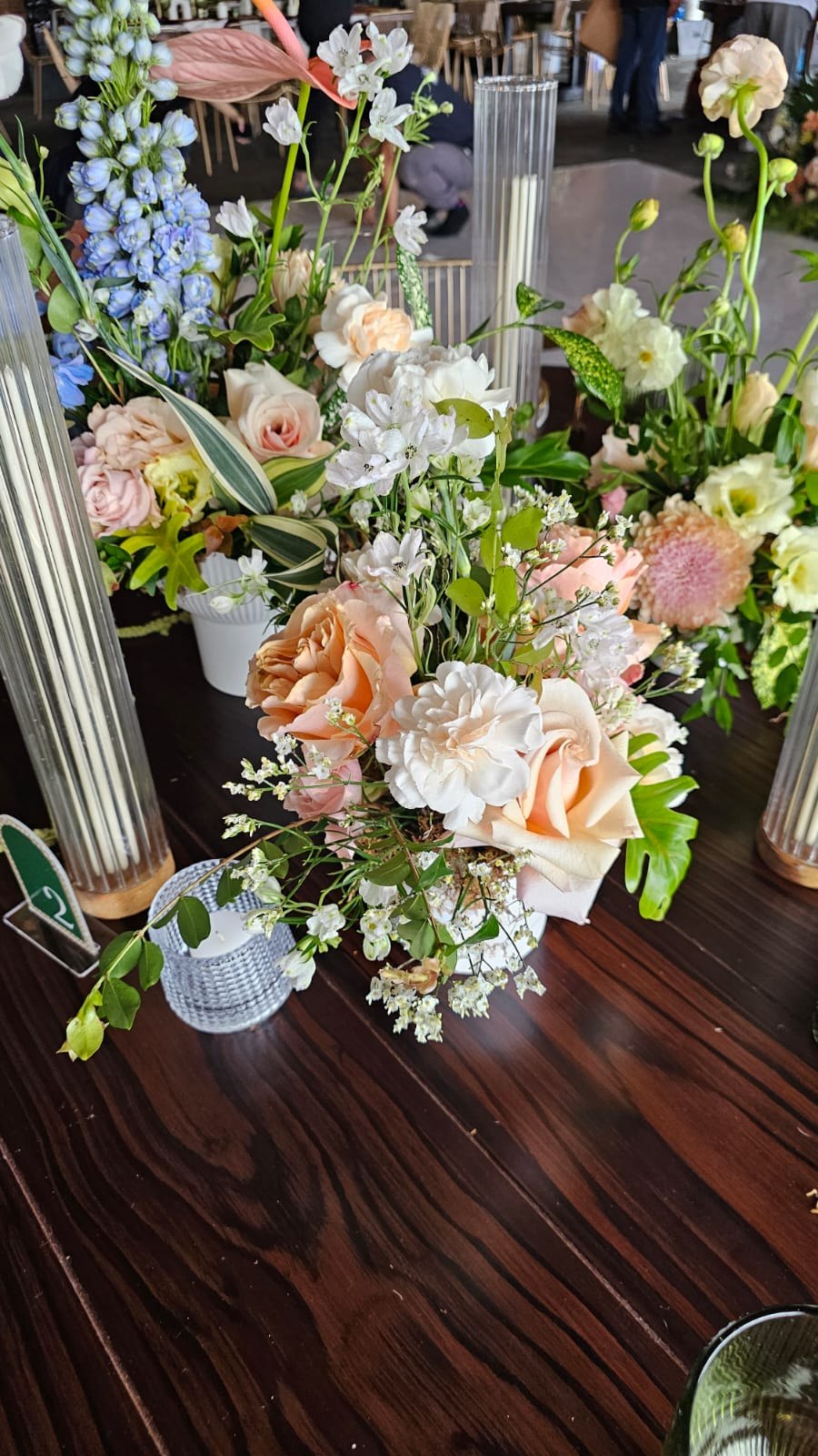 Delicate wedding flowers and candles