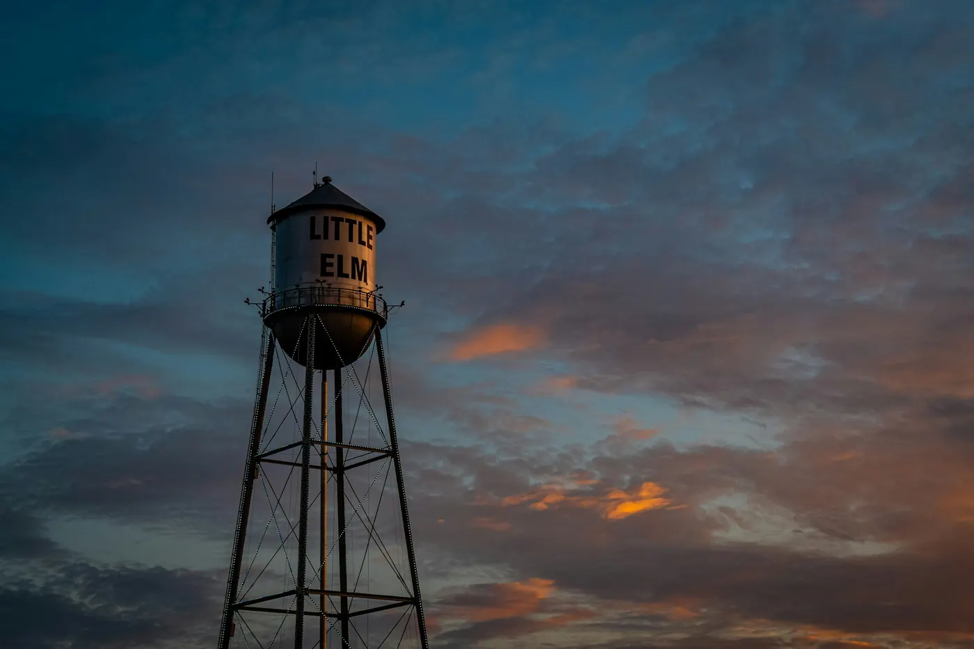 Little Elm water tower at sunset