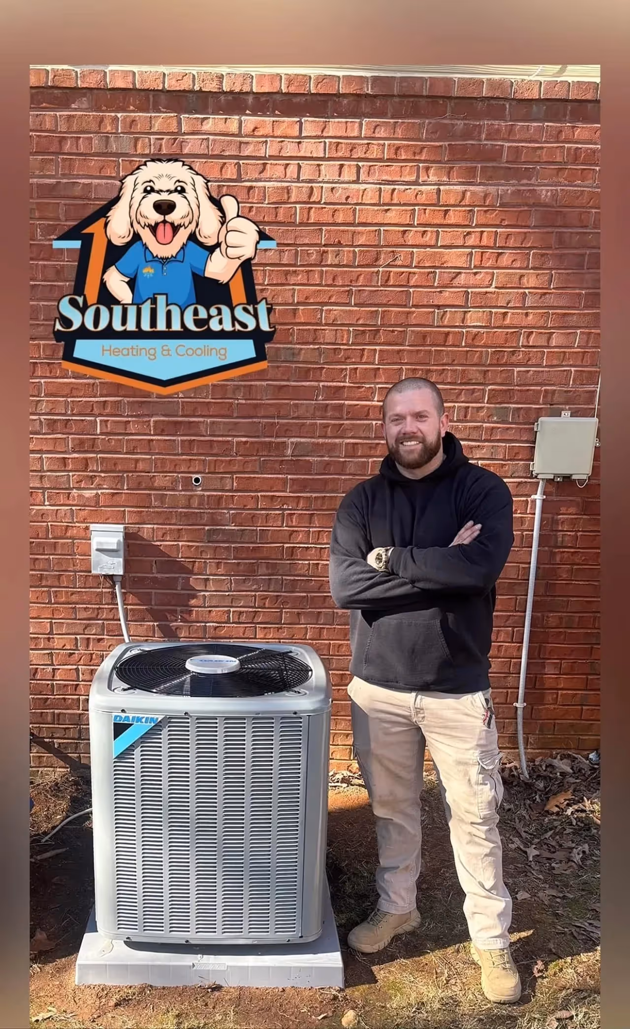 Southeast Heating & Cooling technician with HVAC unit and cartoon dog logo.