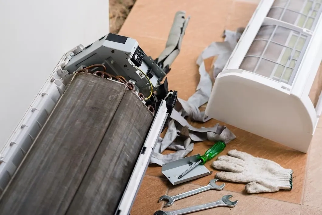  Dirty, disassembled indoor air conditioning unit.
