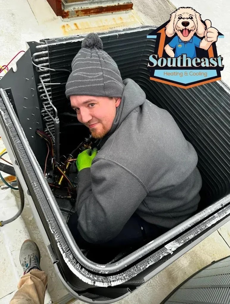HVAC technician inspecting an air conditioning unit indoors for optimal performance