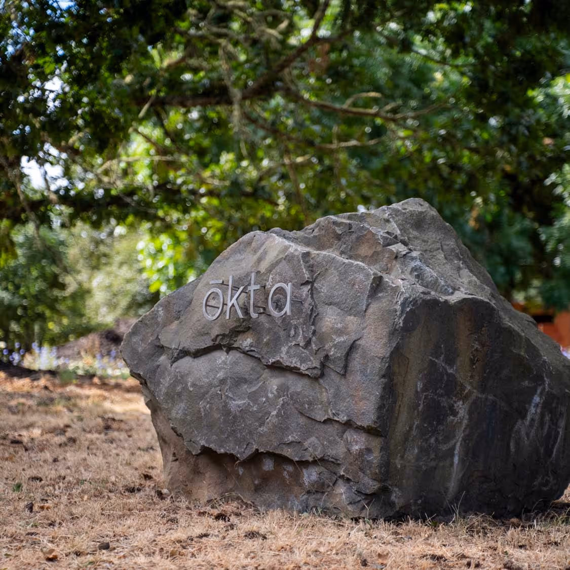 Restaurant sign carved into a large stone