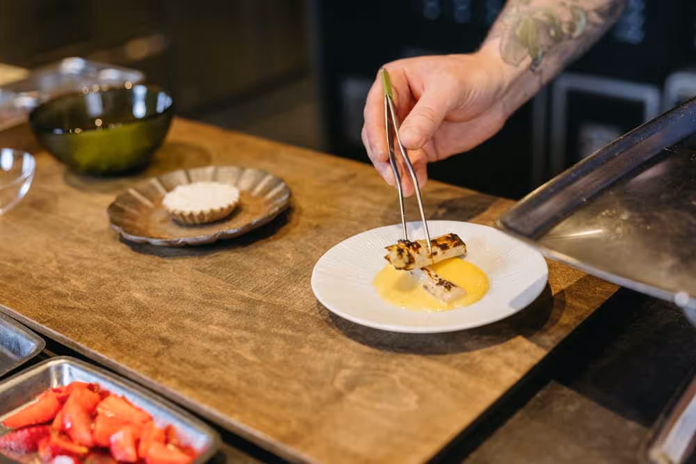 okta farm and kitchen Chef preparing breakfast items