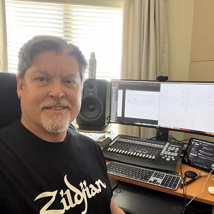 Phil Hodges at his work desk for design and audio