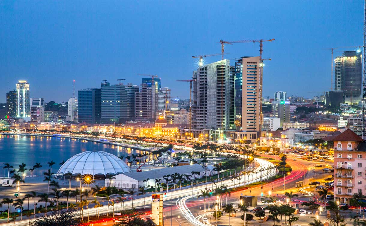 Angola's modern and growing beach front. Beautiful evening scene with cranes showing all the new construction going on.