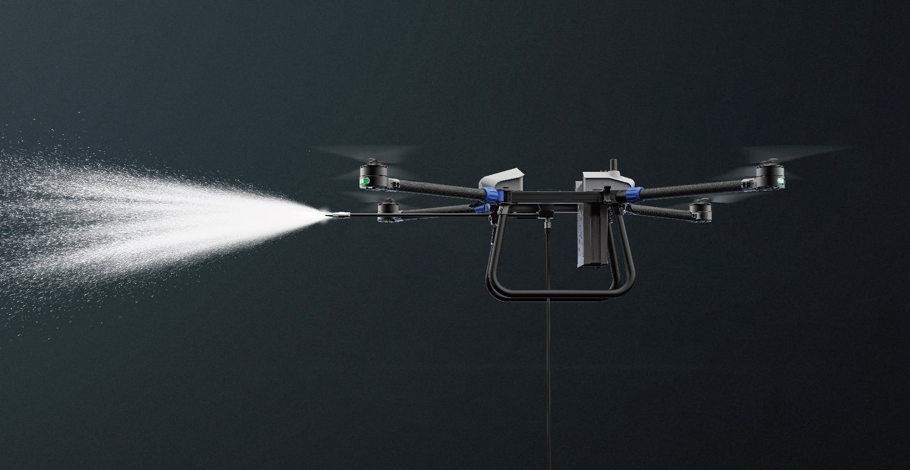 Black drone spraying mist from a nozzle against a dark background.