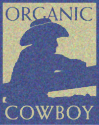 The Organic Cowboy logo designed by Freestone Creative Co. placed in front of a photo of a dog kissing a horse.