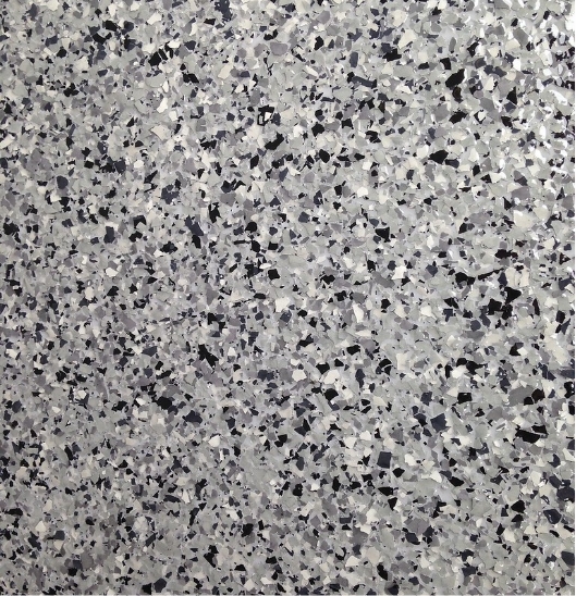 Speckled design similar to a flooring made of epoxy.
