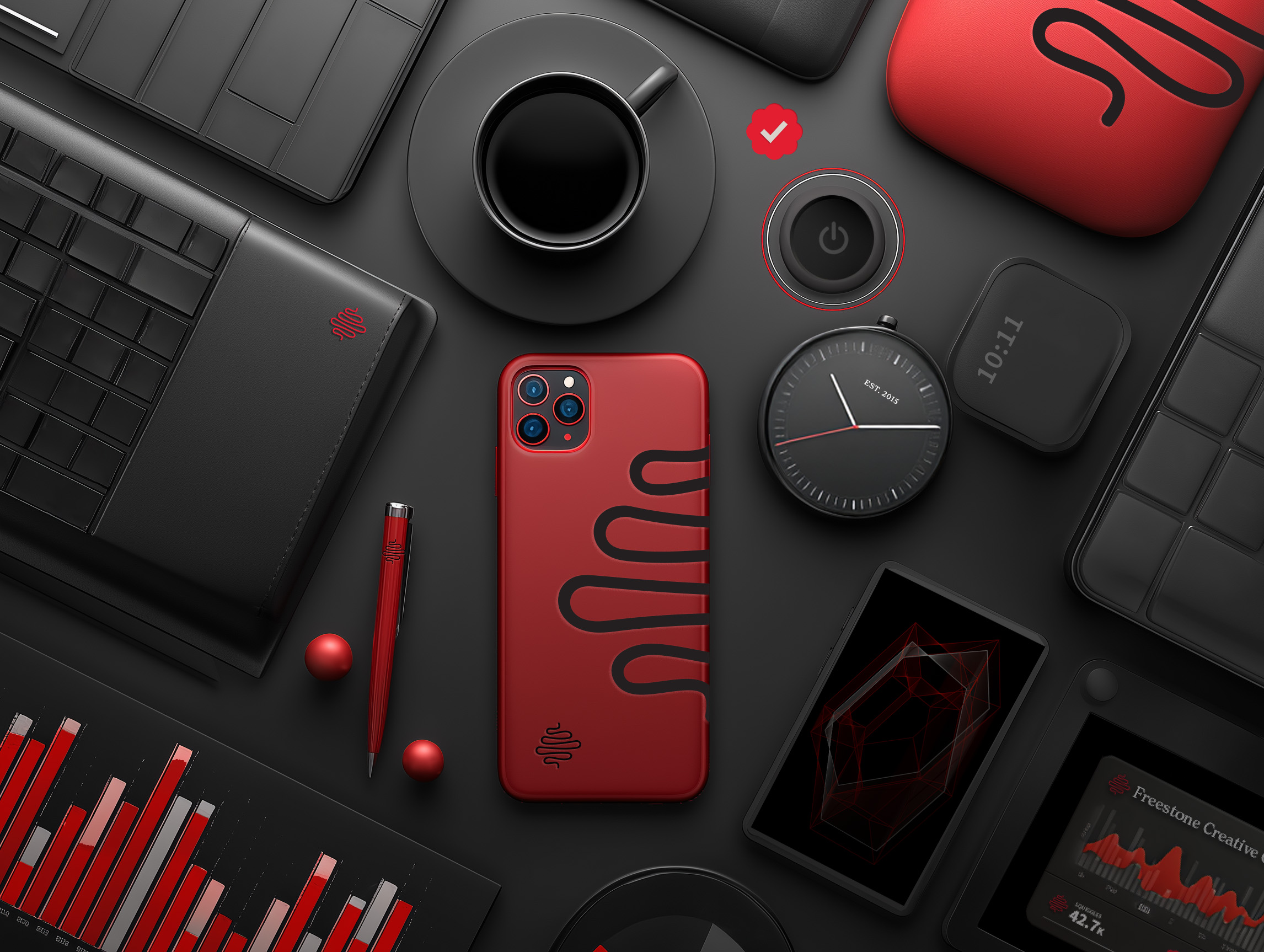 Pieces of technology in Freestone Creative Co. branded colors and logos.