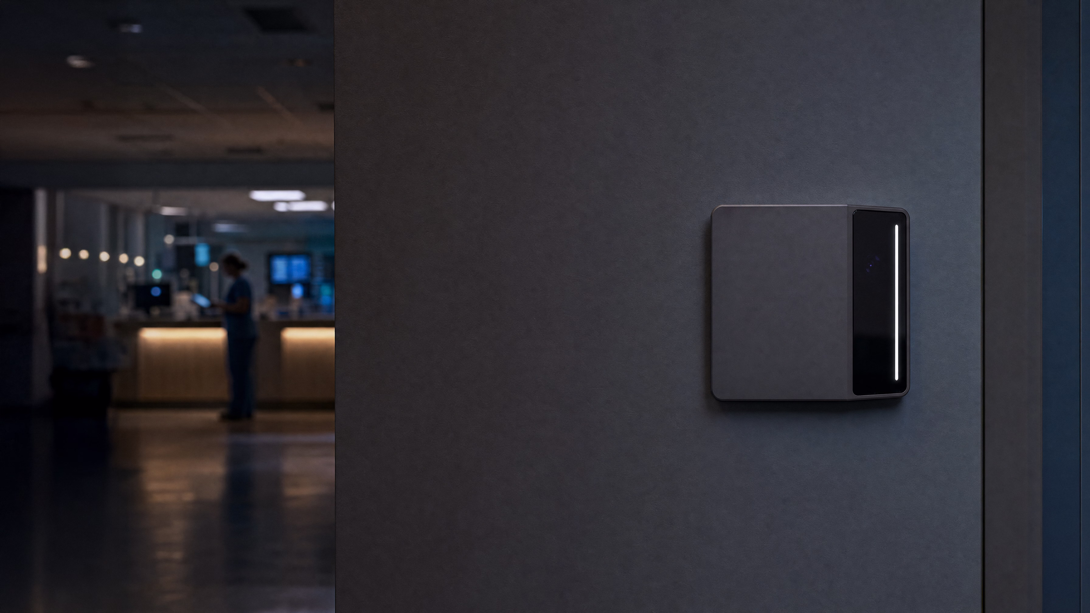 A Rock X on a hospital corridor wall, a nurse station glowing in the distance