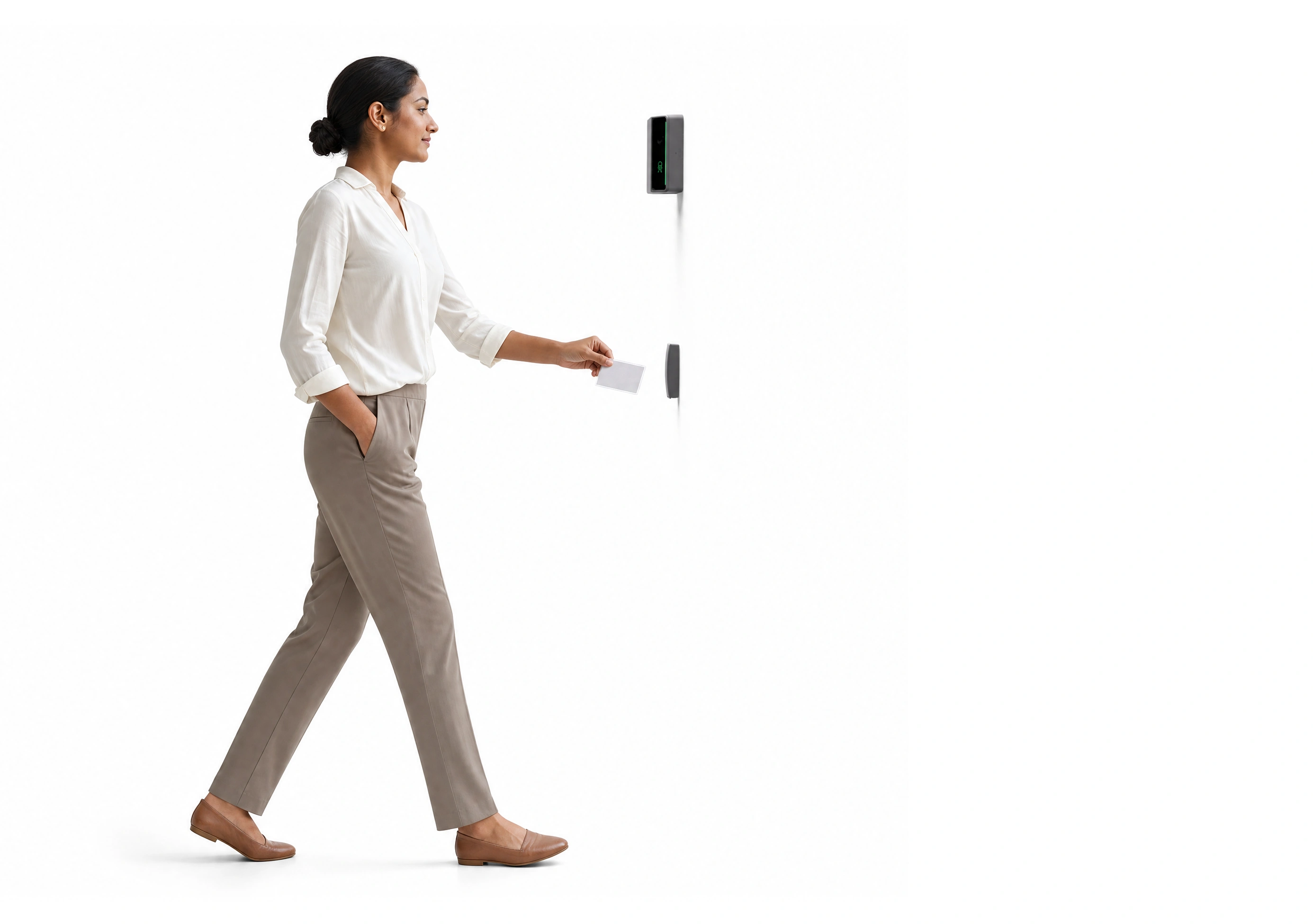 A woman walking up to a wall-mounted Rock reader and presenting her badge to the card reader below it