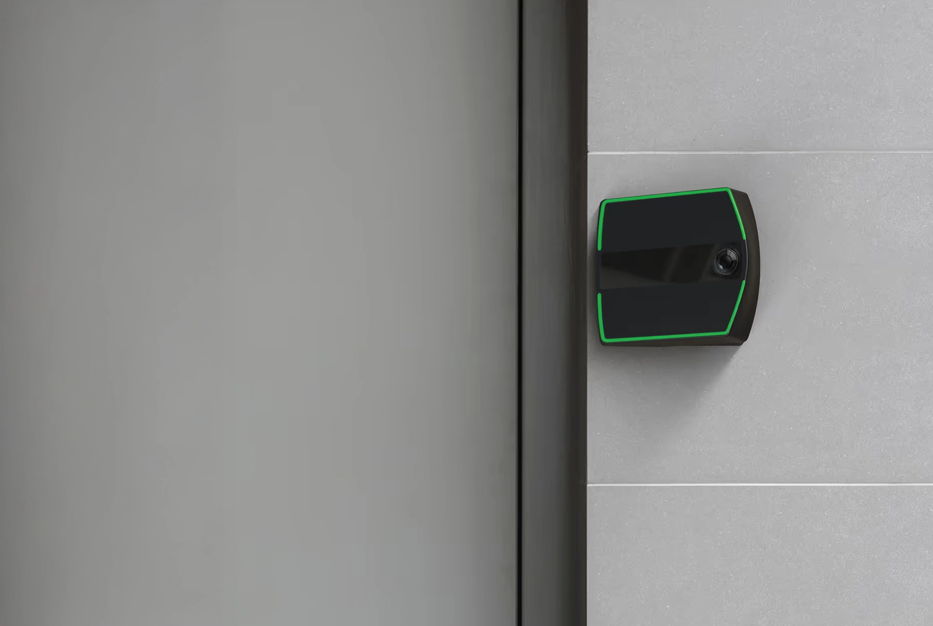 The Rock mounted beside a door, edge lit green
