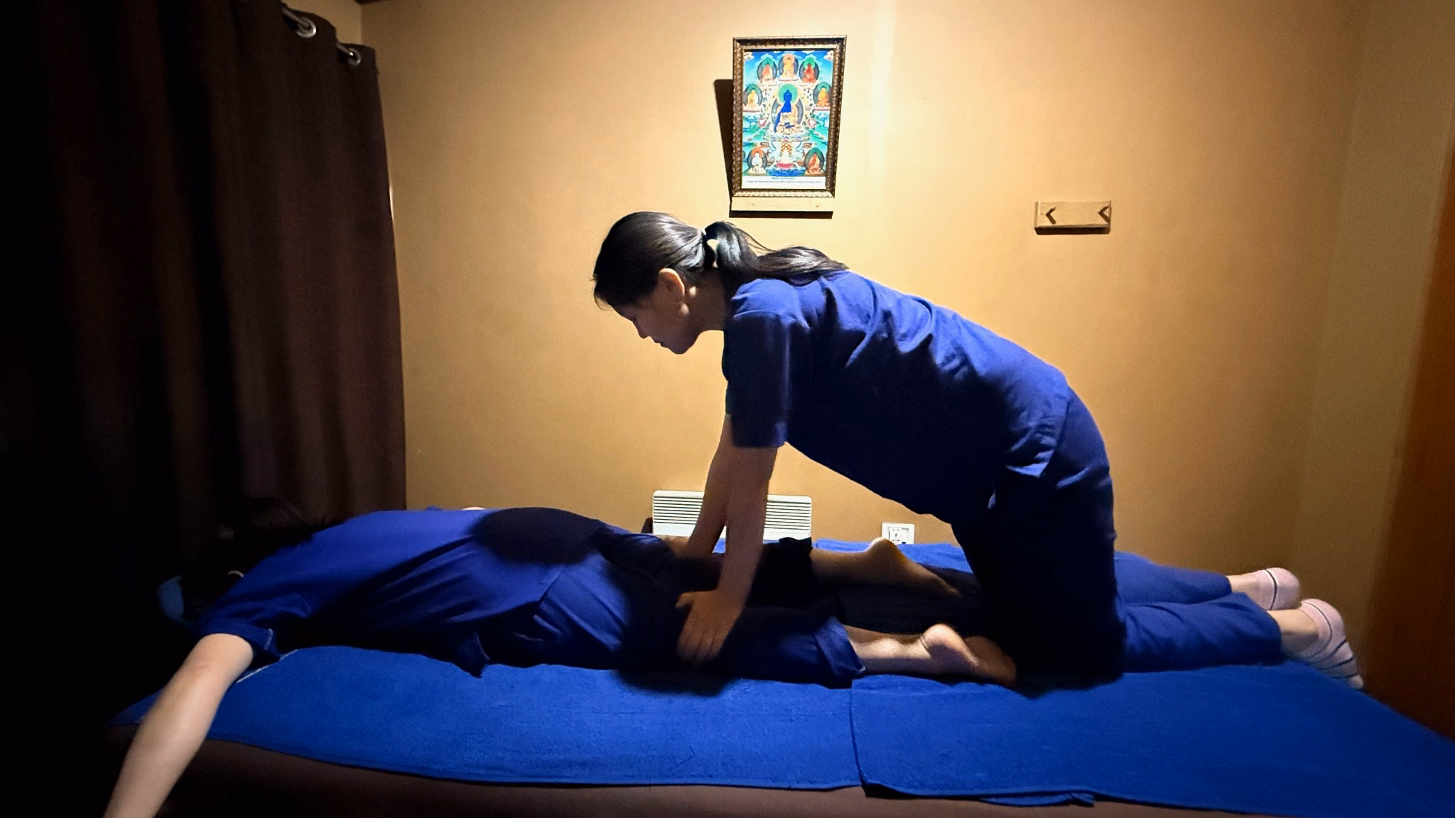 A guest receiving a restorative massage during a Bhutan wellness experience.