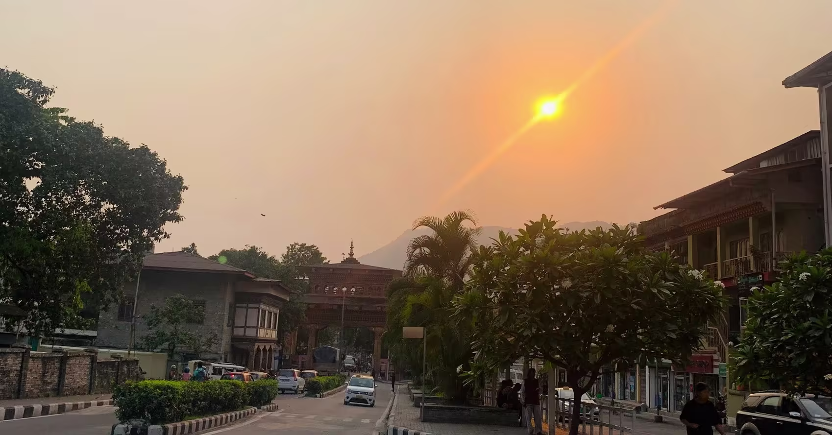 A quiet street in Samdrup Jongkhar at sunset marks the eastern gateway into Bhutan from Assam.