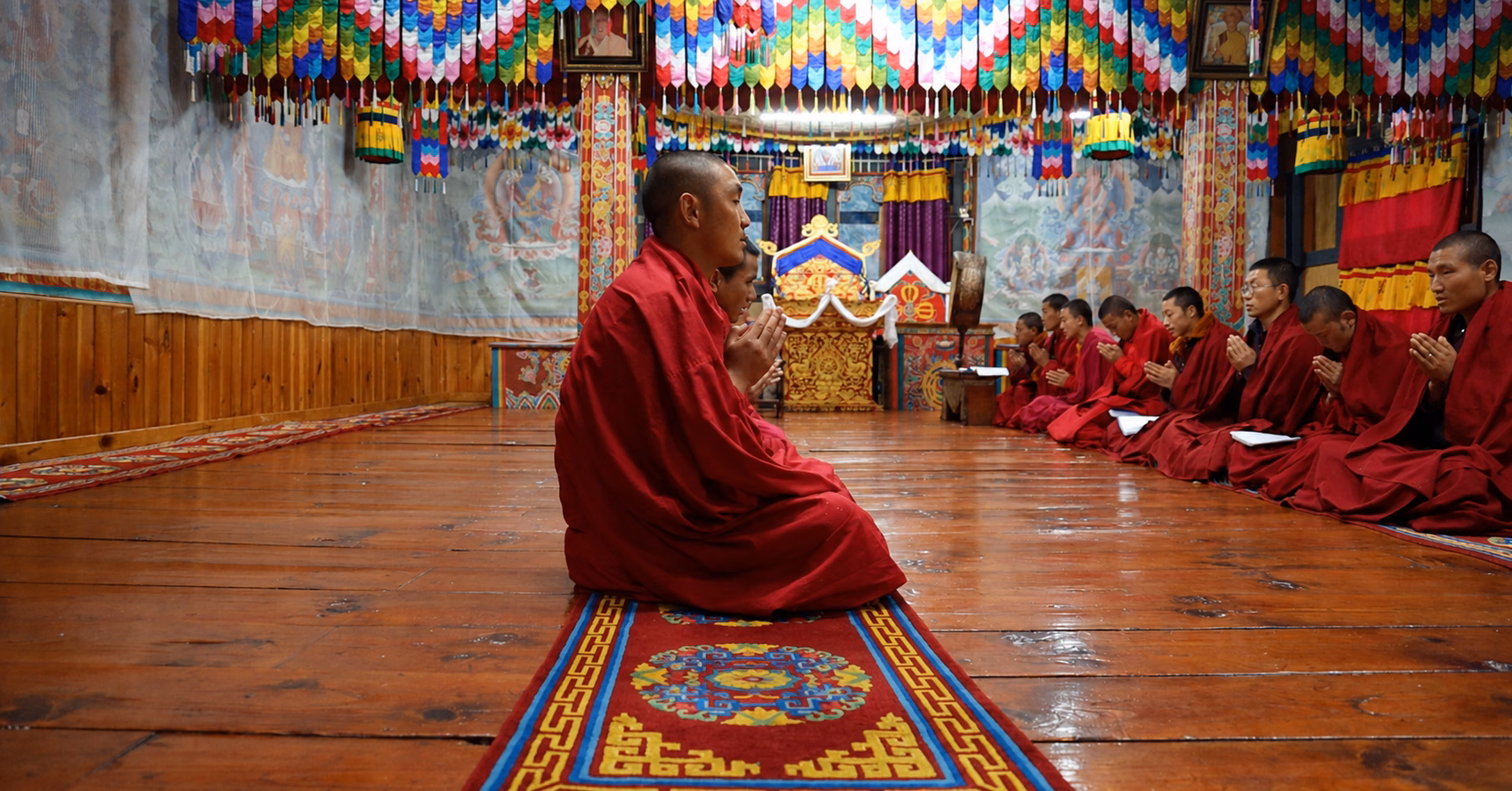 Monks gathered for prayers inside Gangtey Monastery in Bhutan
